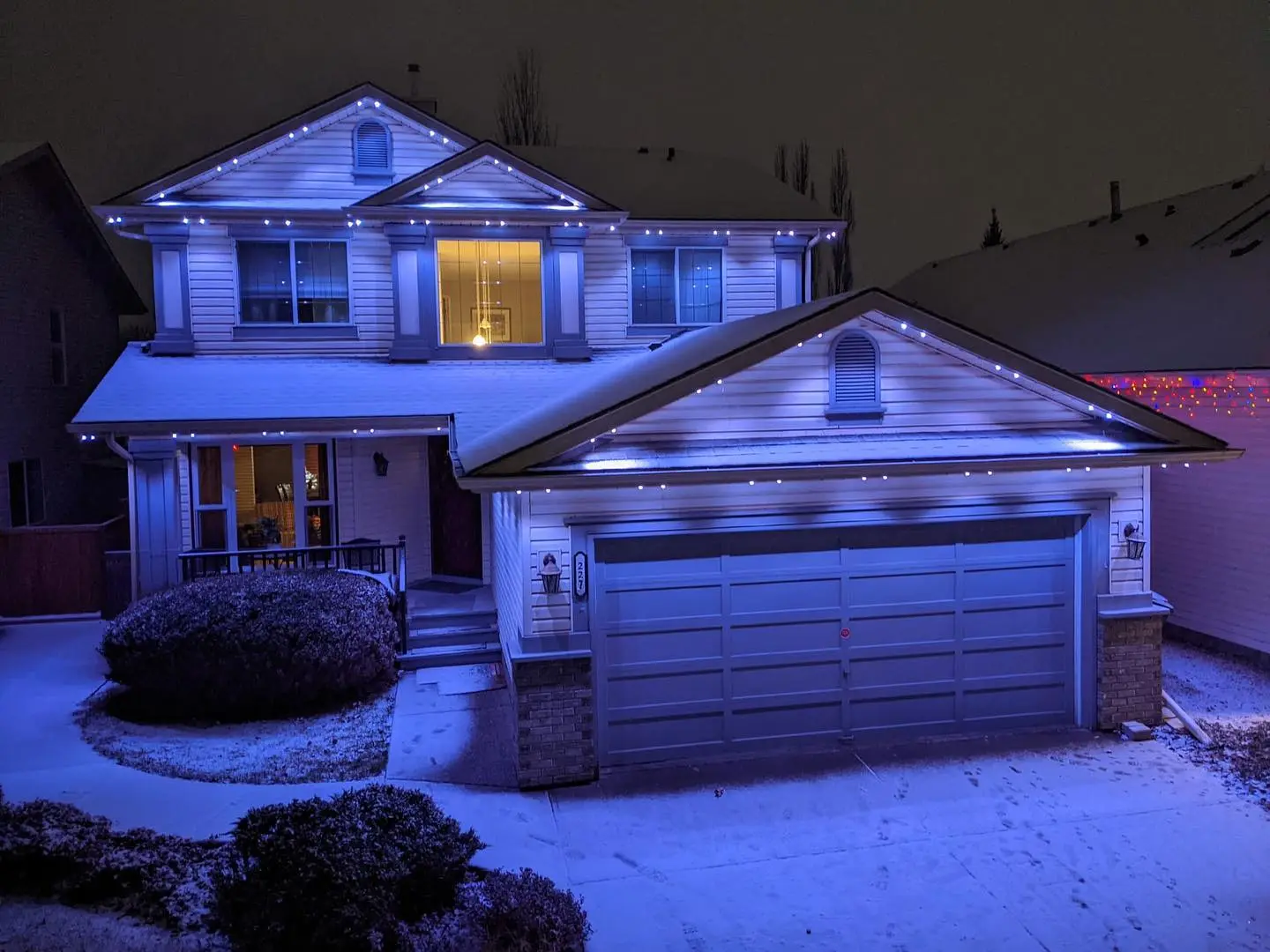 Landscape lighting project — Backyard Oasis: Creating a warm, inviting atmosphere for evening entertainment.